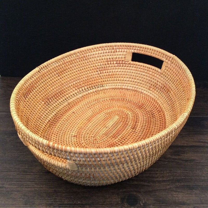 Oval rattan basket with handles
