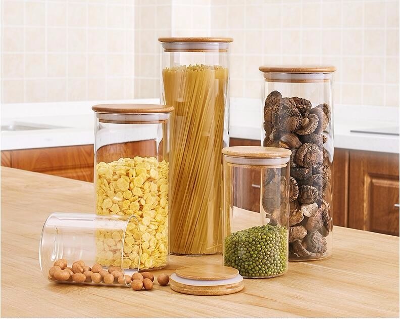 tarros-cilindricos-de-cristal-para-cocina-con-tapa-hermética-de-bambu-conteniendo-alimentos